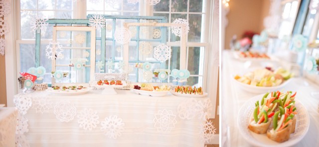 winter-wonderland-appetizer-table-windows-snowflakes-garland-cookies-cupcakes