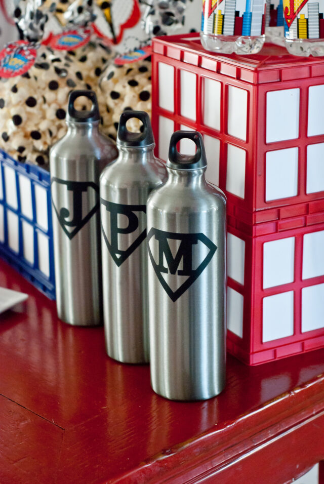 Vintage comic book birthday party setup with colorful superhero desserts and printable decor