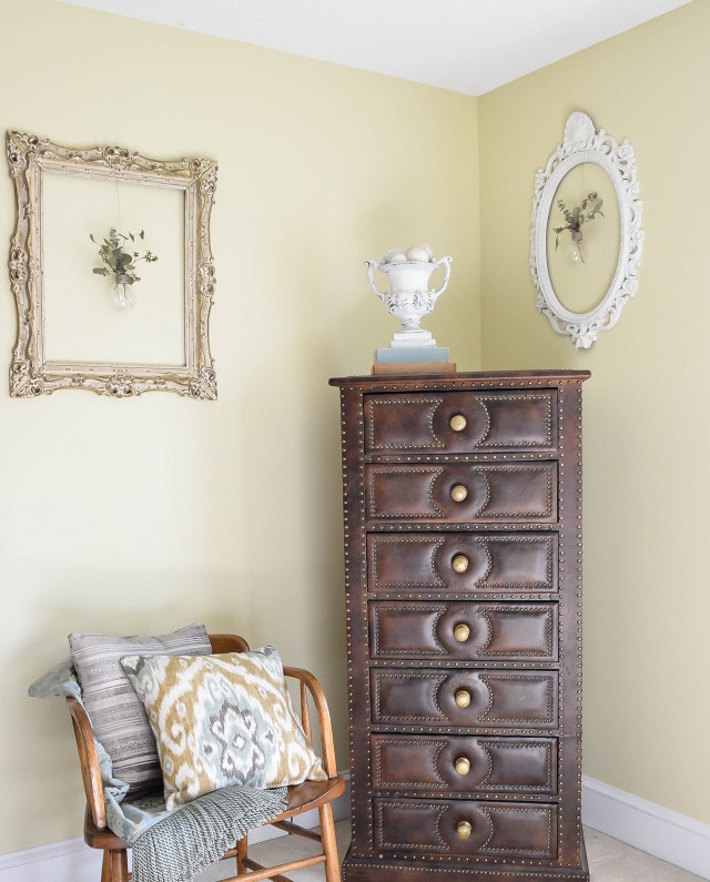 Bedroom decor with frames and lightbulb vases