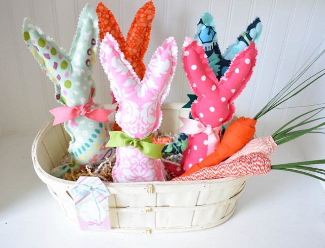 easter basket with fabric bunnies and twine carrots