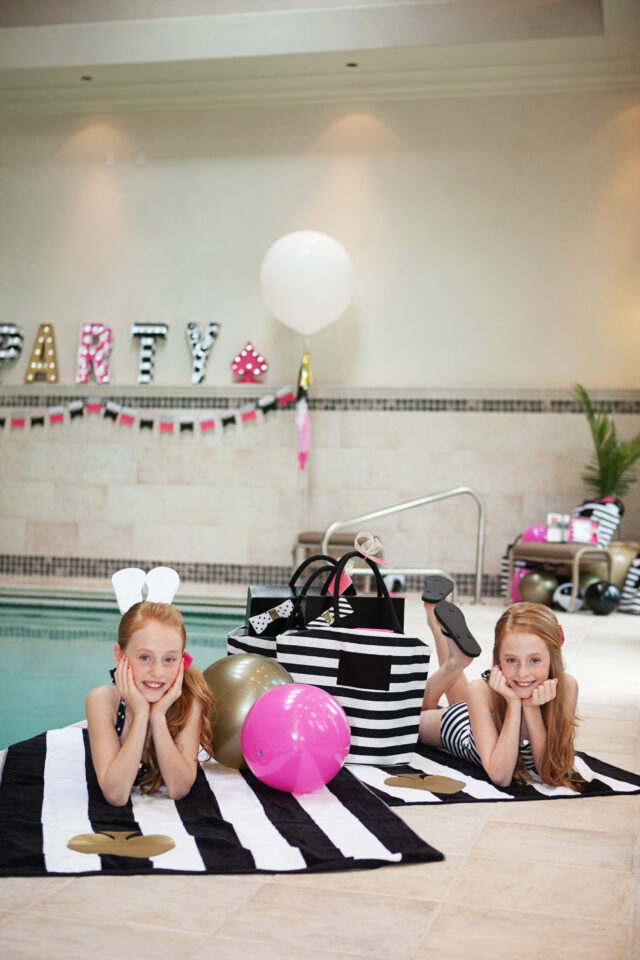Custom birthday invitation featuring stripes, glitter accents, and stylish party branding.