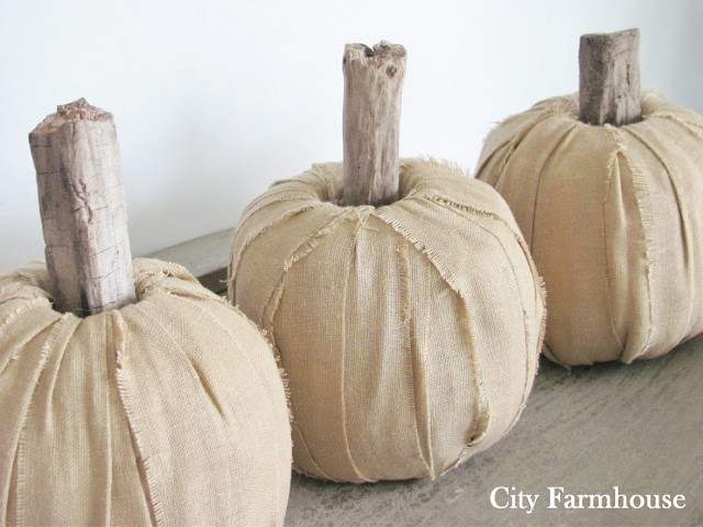 fabric pumpkins with driftwood stems