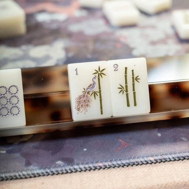 Brownstone Bloom Mahjong tiles by Anders Ruff x Indigo Pruitt Design Studio, featuring botanical details, a moody color palette, soft lavender and mauve accents, and elegant hand-finished designs inspired by Brooklyn brownstones.